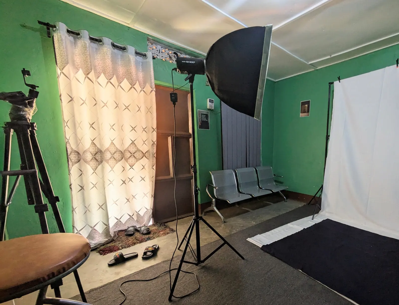 Gophine Services photography studio with softbox lighting and backdrop